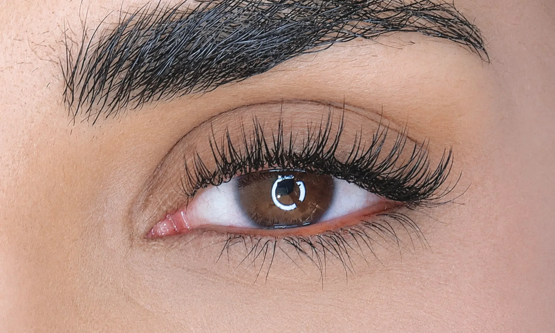 Classic lash extensions in Dubai, one extension per natural lash after treatment at AZIZAM beauty salon