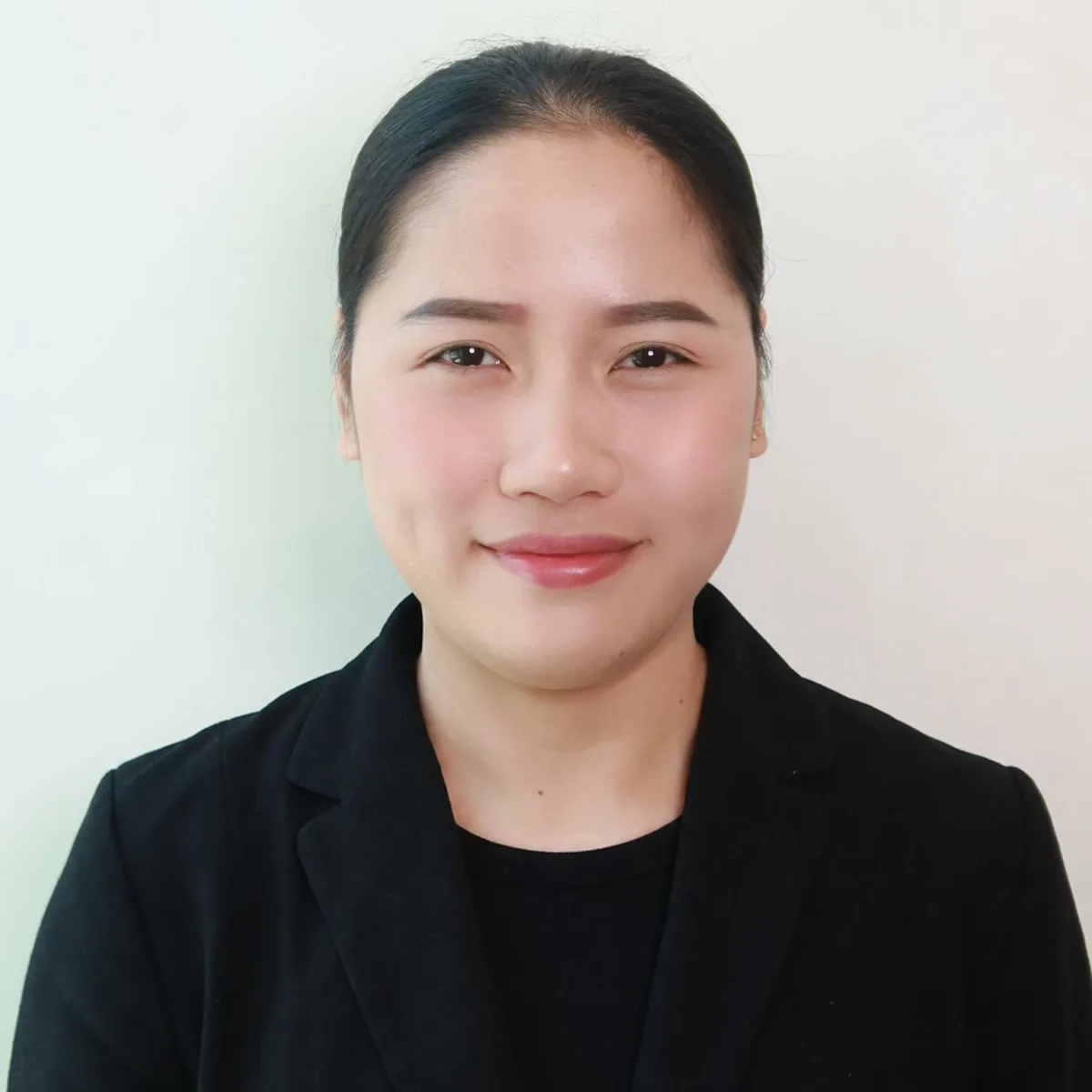 Arrah, receptionist at AZIZAM beauty salon in Dubai
