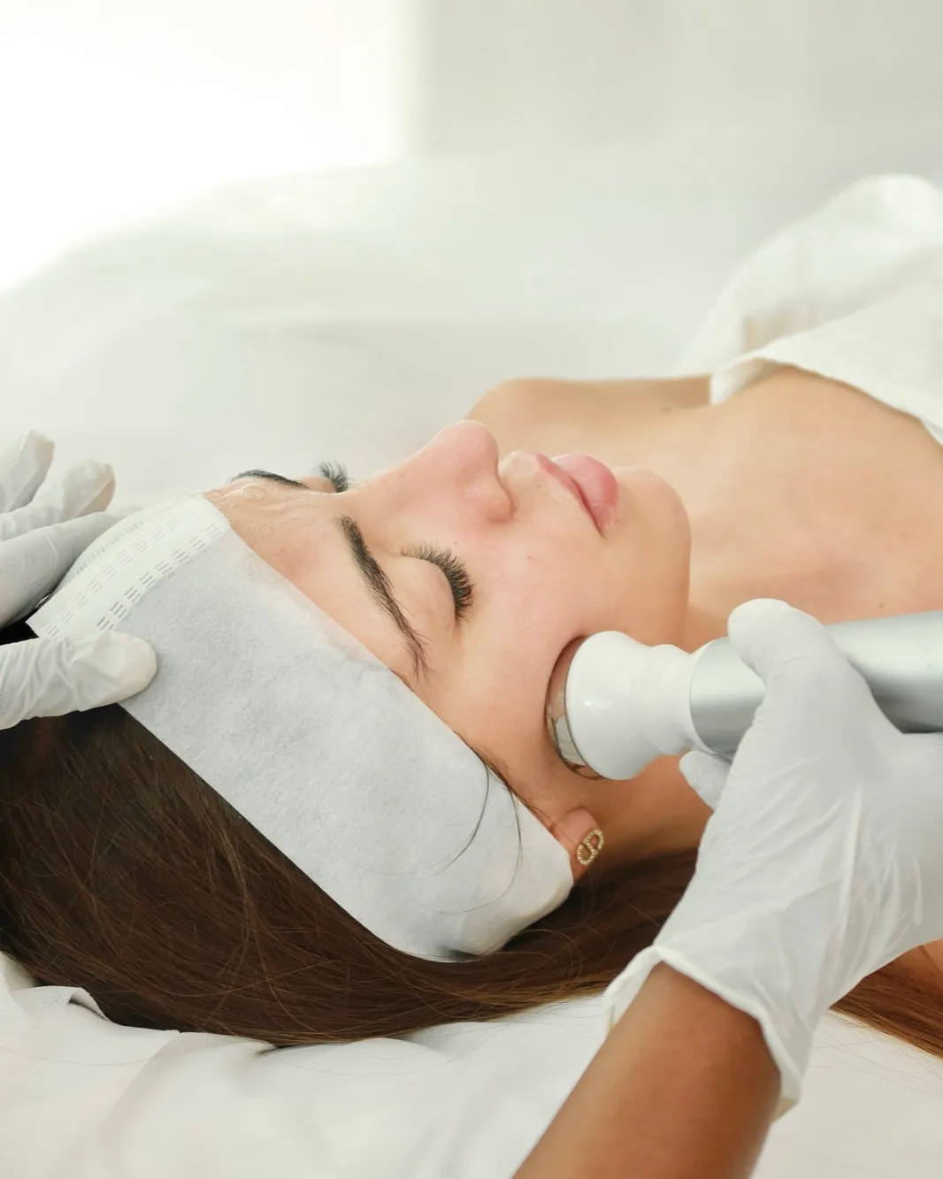Brightening facial in Dubai, treatment in progress at AZIZAM beauty salon