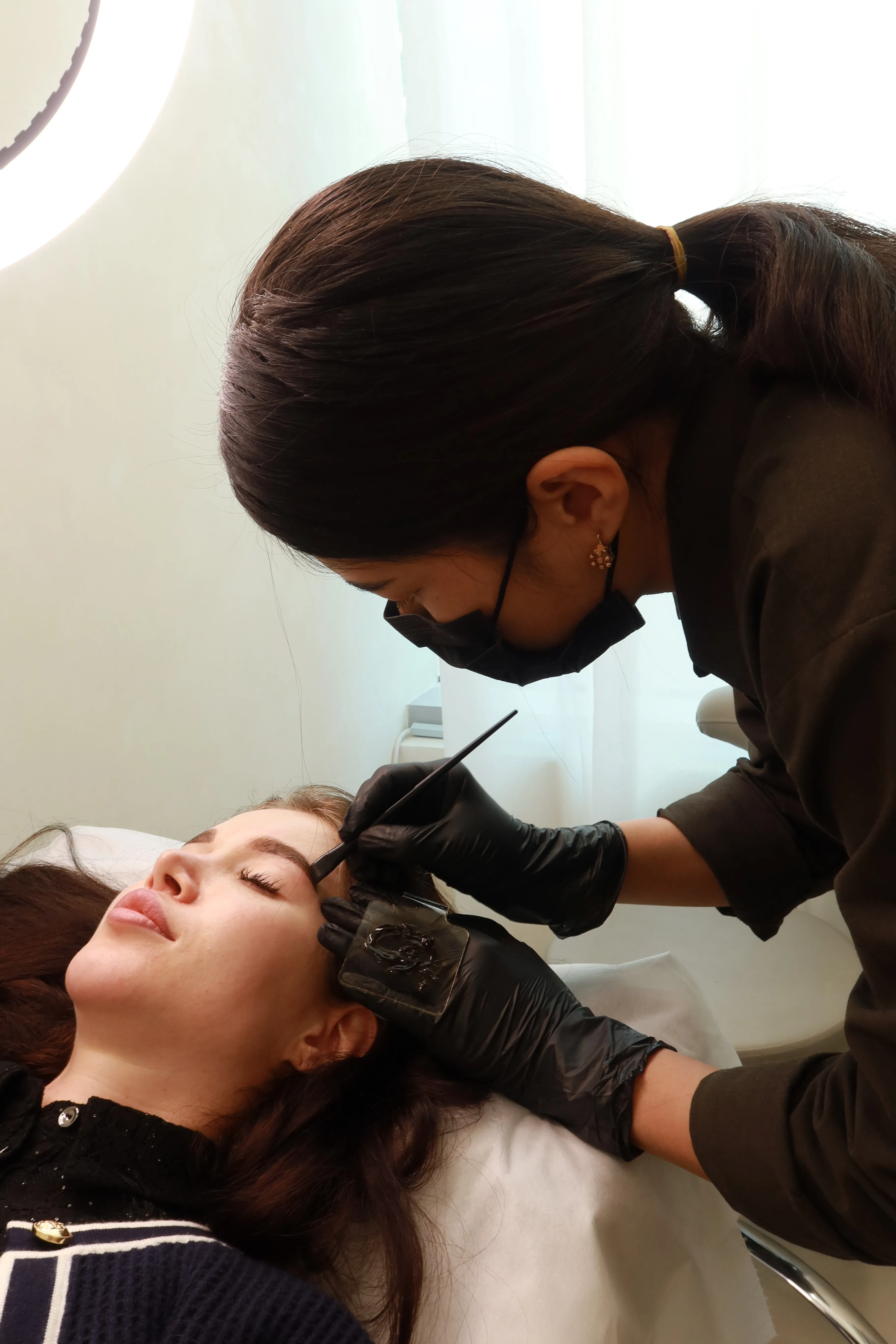 Brow lamination result at Azizam beauty salon in Dubai — brushed-up, groomed finish