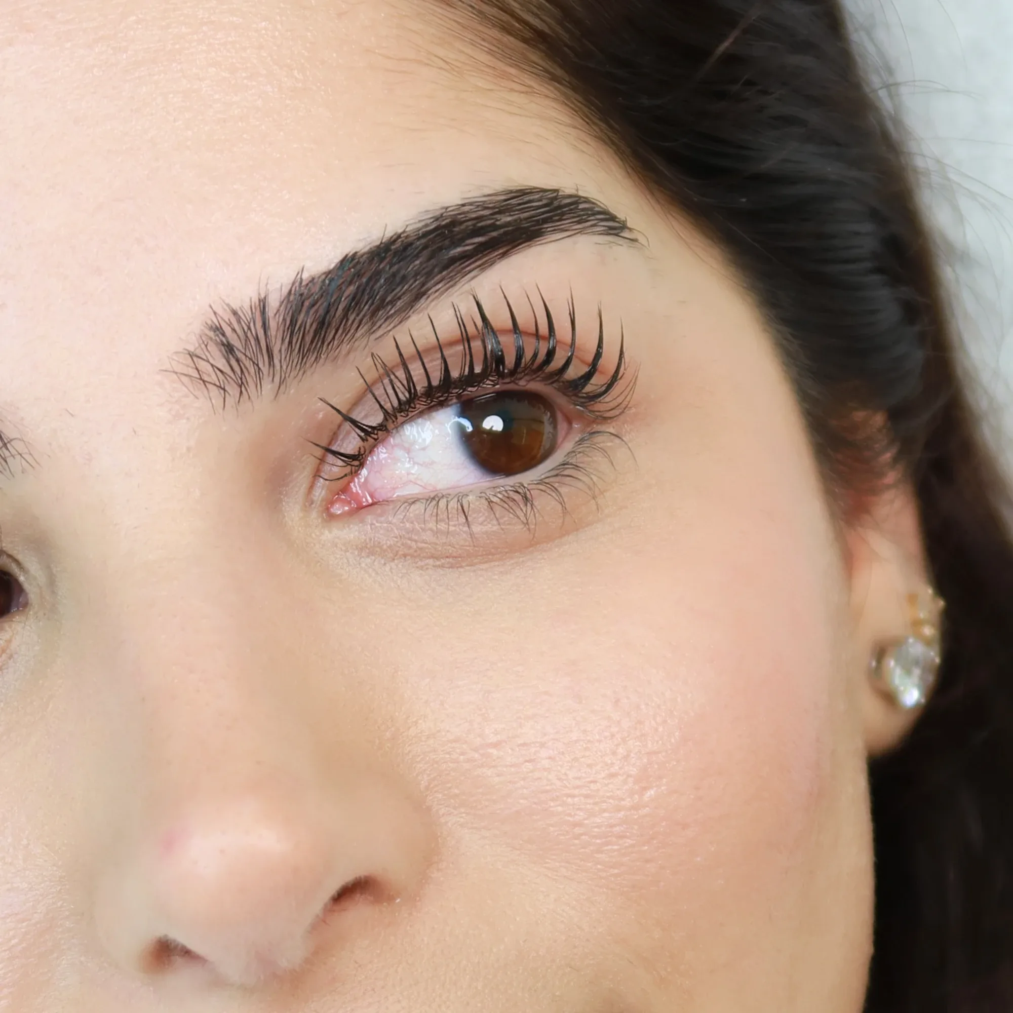 Lash lift result in Dubai — lifted natural lashes, eyes open at AZIZAM beauty salon